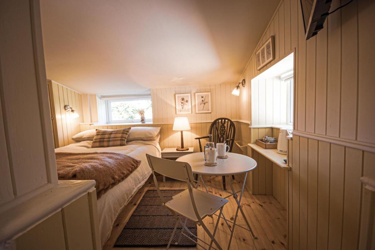 The Old Smithy Inn Welcombe Eksteriør billede